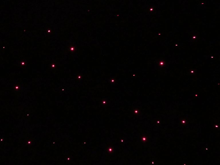Collection of Red Lights on Black Background in Sensory Room